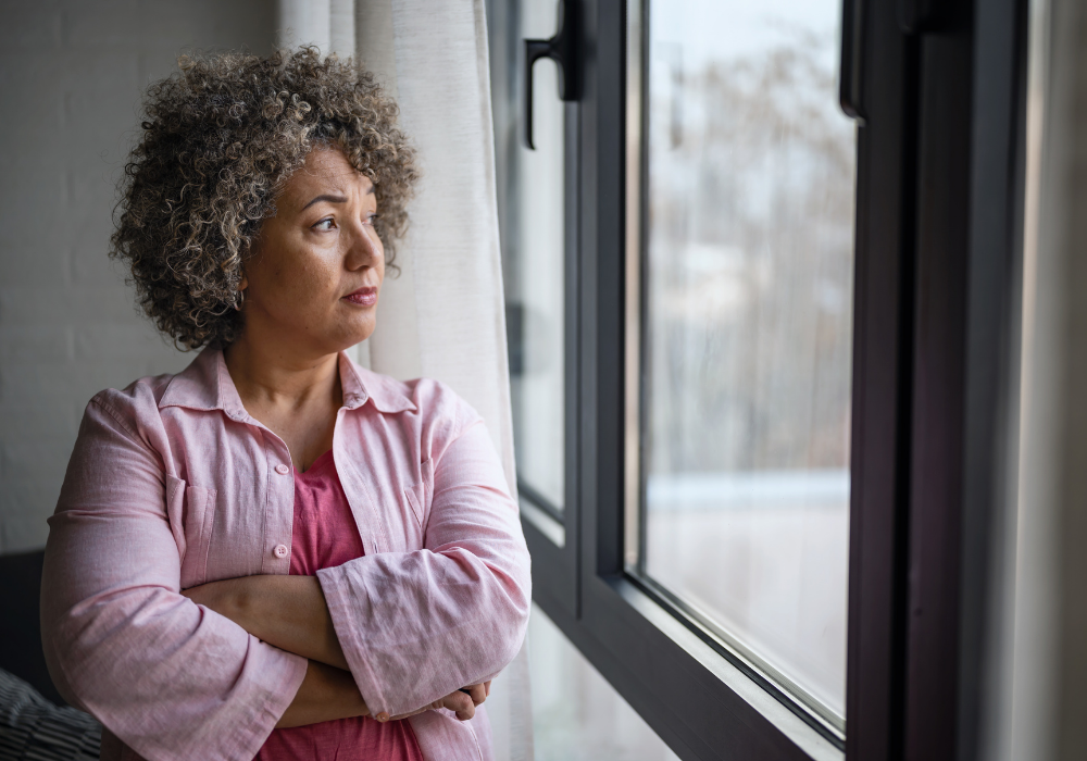 A woman reflecting on changes in her health and wellbeing